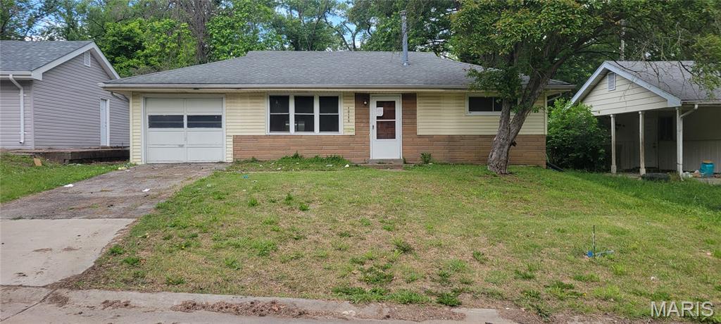 Investor opportunity suitable for fix and flip or adding to rental portfolio. Exterior boasts vinyl siding with decorative brick veneer and vinyl windows. Additionally featuring attached garage, storage shed, and concrete patio.  Interior has been cleared out for a blank slate in need of rehabilitation. Utilities are currently off, sold as is. Seller will not provide any repairs or inspections.