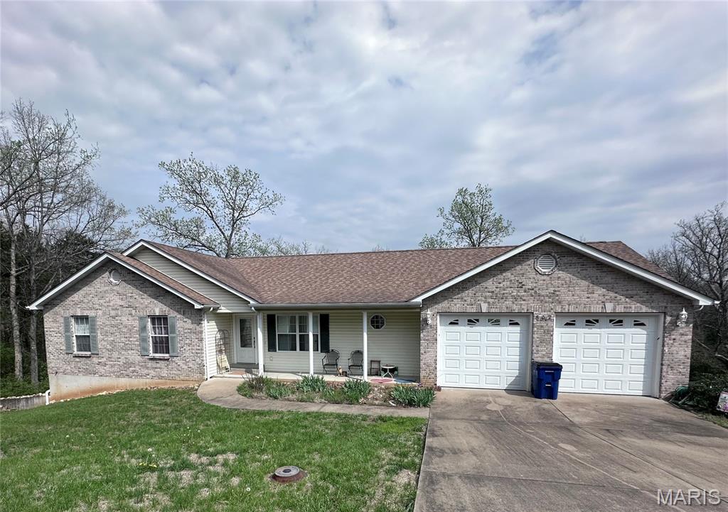 Discover a harmonious blend of comfort and style at 802 Donaldson ST, DeSoto MO 63020. Built in 2005, this single-family residence presents an attractive property in great condition, offering an exceptional opportunity for a fulfilling lifestyle. This ranch-style home features three inviting bedrooms, providing ample space for relaxation and personal retreats. The living room, dining and kitchen boast of an open floor plan. Two well-appointed bathrooms offer convenience and comfort for residents and guests alike. An attached oversized garage(approximate 23'x31') provides secure parking and additional storage space, while a welcoming porch offers a charming space to enjoy the outdoors. The walk out basement is a blank canvas waiting for the perfect touches to make it your own space. A new heat pump system installed in 2025 takes care of those HVAC needs. The home is surrounded by woods on two sides for a quiet tranquil feel. A creek for exploring runs behind and at the edge of the property. This home is located in a quiet neighborhood with in minutes of all kinds of amentities including dining, shopping, several parks and much more. Located in the city limits of DeSoto this property offers great history, heritage and a community feel to it.  Embrace the chance to experience this remarkable property firsthand; schedule your private viewing today.