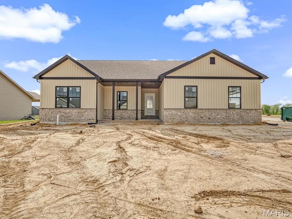 New construction home in the desirable Quail Ridge subdivision, located directly across from Mystic Oak Golf Course. This ranch-style home offers approximately 1,731 sq ft with a split-bedroom floor plan, 3 bedrooms, and 2 full baths. The main living area features an open layout with Coretec LVP flooring and an upgraded electric fireplace with mantel. The kitchen includes quartz countertops, a GE appliance package, and ample cabinetry. The primary suite offers a spacious layout with a large walk-in closet and a private bath featuring a full tile shower and ceramic flooring. Additional features include a full unfinished basement with bathroom rough-in, 9’ ceilings, 92% high-efficiency HVAC system, and all wood shelving throughout. Exterior highlights include an oversized covered patio, stamped concrete, corner lot, and side-entry garage. Located in a well-established HOA community offering amenities including a clubhouse, fishing lakes, swimming pool, and sidewalks.