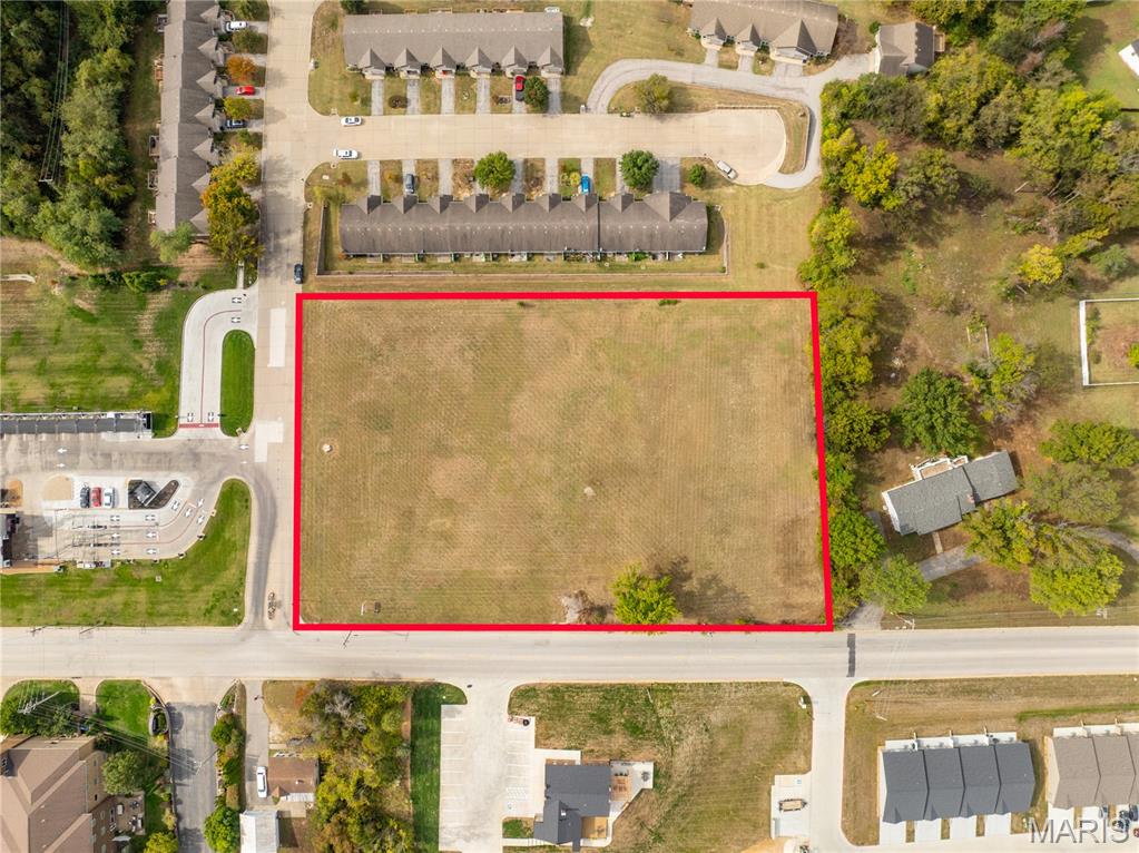 Prime 2.43-acre commercial tract in the heart of Washington, perfectly positioned within the thriving growth corridor between Highway 47 and Interstate 44, just off Highway 100. The property is next to Club Car Wash to the south and sits directly across from the Best Western Hotel. Ideal for a convenience store/gas station, bank, or hotel—this high-visibility site offers unlimited potential. All city utilities are available. Aerial video is available.