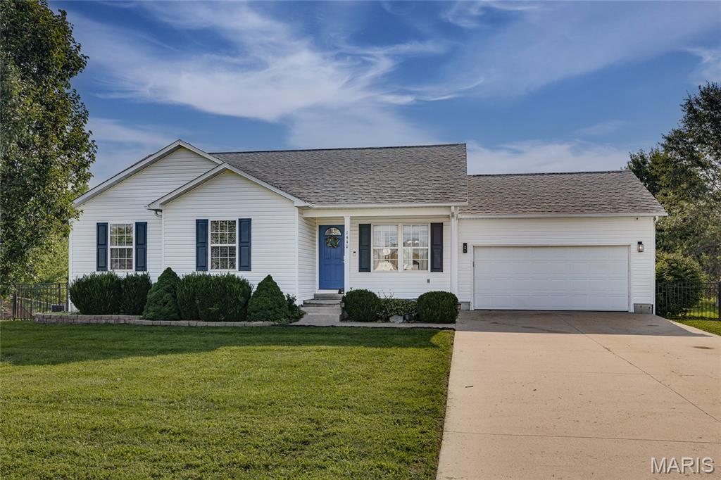 Welcome to this spacious 4-bedroom, 3-bath home offering approximately 2,600 square feet of finished living space in Farmington. A covered front porch welcomes you inside, where vaulted ceilings and a functional floor plan provide plenty of room for everyday living and entertaining. The main level features a well-equipped kitchen with generous storage, along with convenient main-floor laundry. With four bedrooms, three full bathrooms, an office and additional bonus space, there is flexibility for a variety of needs.

The finished walkout lower level adds even more usable living space and opens directly to the backyard. Outside, enjoy a back deck overlooking the large, fenced yard with plenty of room for outdoor entertaining, gardening, pets or play. An attached two-car garage with additional workspace and storage adds everyday convenience.

Additional features include hardwood, tile and carpet flooring, a whole-house water filtration and softener system, reverse osmosis drinking water system, sump pump with battery backup and low-maintenance landscaping. Conveniently located within Farmington city limits with easy access to schools, parks, shopping and everyday amenities, this home offers plenty of space, storage and versatility inside and out.