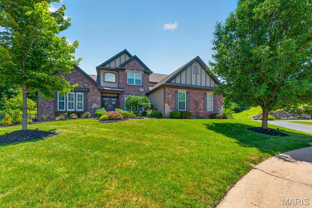 Welcome to the home where luxury meets everyday living! This exceptional 1.5-story residence offers over-the-top amenities, thoughtful design, and the perfect layout for today's busy family. From the moment you step inside, you'll be captivated by the soaring great room anchored by a cozy gas fireplace and flooded with natural light. The heart of the home is the stunning chef's kitchen, featuring an oversized center island, stainless steel appliances, abundant cabinetry, and seamless flow into the breakfast and living areas—ideal for everything from weekday dinners to weekend entertaining. An elegant dining room sets the stage for holiday gatherings, while the private main-floor office provides the perfect work-from-home space. Retreat to the luxurious main-floor primary suite complete with a spa-inspired bath and an incredible walk-in closet professionally designed with custom organizers. The convenient main-floor laundry makes daily routines effortless. Upstairs, a spacious loft creates the perfect hangout for kids or teens, accompanied by three generous bedrooms, including a private en-suite and two bedrooms connected by a Jack-and-Jill bath. The finished lower level expands your living space with a large recreation area and a private fifth bedroom featuring its own full bath—perfect for guests, in-laws, or an older child seeking extra privacy. Step outside and prepare to fall in love with your own private resort. Spend summer days enjoying the sparkling in-ground pool with slide, host unforgettable gatherings around the custom outdoor kitchen, and unwind around the firepit under the stars. The spacious 3-car garage provides plenty of room for vehicles, storage, and hobbies. This is more than a home—it's the lifestyle you've been dreaming of. Luxury, space, and endless opportunities to make memories, all in one incredible property.