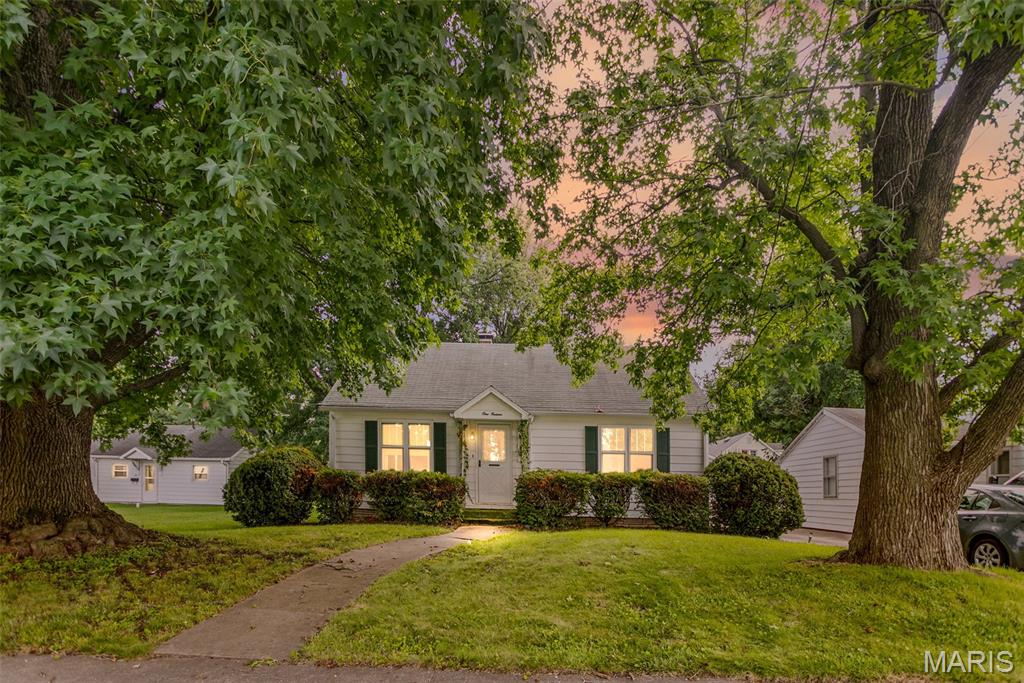 Step back in time! This 1,164 sq ft house features original hardwood floors, combo living and dining space. Upstairs has a partial wall for two separate sleeping areas. The basement has reinforced walls. A perfect space for a family/game room. A beautiful level lot with easy access to schools, restaurants, and shops. Also included is a single elongated garage with separate workshop.