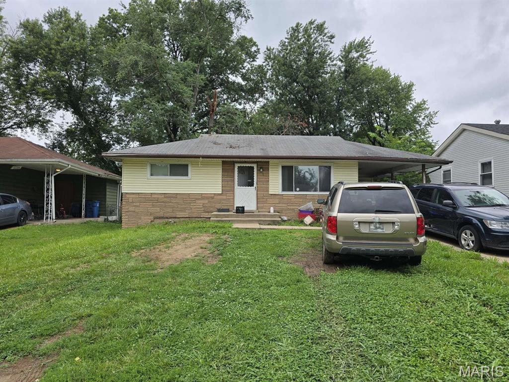 Great investment opportunity! This 3BR/1BA home features a fenced backyard with a shed, carport, driveway, and an unfinished basement. The property needs a new roof and repairs from previous water damage, offering plenty of potential for renovation. Sold as-is.