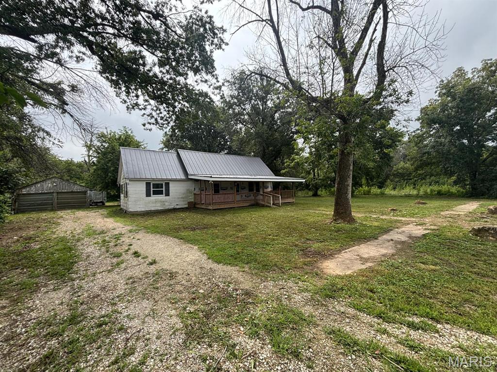 Welcome to 315 N. Center Street in Hunnewell, MO! This spacious 2-bedroom, 1-bath home offers a versatile opportunity for homeowners and investors alike. Inside, you’ll find a generous kitchen, dedicated dining area, and comfortable living room with plenty of space to relax or entertain.

Numerous recent updates add convenience and peace of mind, including a **new metal roof, HVAC system, water heater, vinyl windows, vinyl plank flooring, stainless steel kitchen appliances, PEX plumbing, updated breaker box, and a covered front porch**.

Outside, the property features a spacious backyard and detached 2-car garage, providing excellent space for parking, storage, hobbies, or outdoor enjoyment.

Located in the **Monroe City R-I School District**, the home is approximately a five-minute drive from Monroe City with convenient interstate access. Mark Twain Lake is also just a short drive away, offering easy access to boating, fishing, camping, and other recreational activities.

With substantial updates, plenty of space, and a convenient small-town location, 315 N. Center Street is ready for its next owner. **See it, Love it, Own it!**