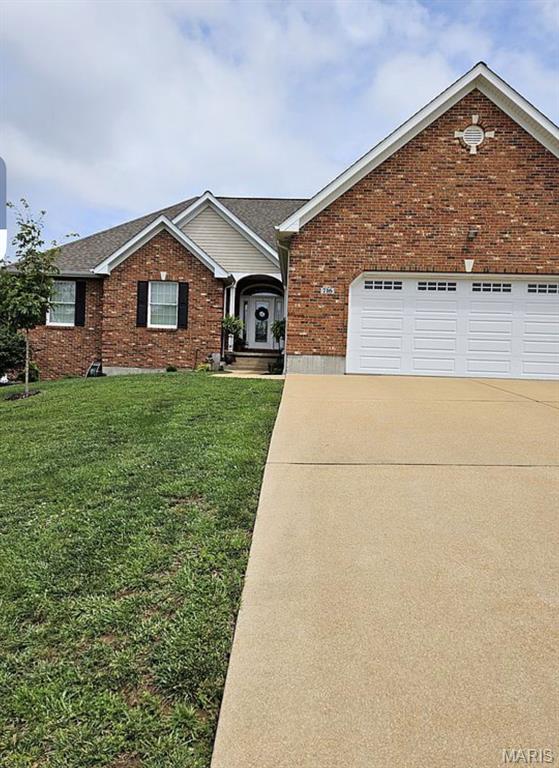 Entered for Comp Purposes... 3-bedroom ranch, open floor plan, hardwood flooring, main floor laundry, custom kitchen cabinets & center island, appliances including washer & dryer stay, generous sized back patio, 3rd full bathroom in lower level, 2 car main entry garage and extra 3 car side/basement garage with an additional driveway.