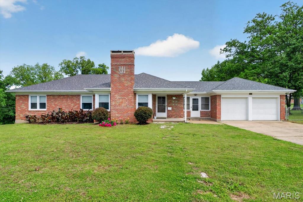 Updated Brick Ranch in the Heart of Washington! Enjoy effortless living in this beautifully maintained 1,552 sq. ft. brick ranch, perfectly situated on a spacious .379-acre corner lot. This home offers incredible peace of mind with major updates, including a brand-new roof (2025) and high-efficiency windows (2021). Inside, you'll find stunning hardwood floors and a light-filled floor plan. The fully fenced backyard is perfect for pets and entertaining. Located in a prime spot with access to great schools, you are just blocks from Mercy Hospital and downtown, and only feet from the Hummingbird Club. A move-in-ready gem in a fantastic location!