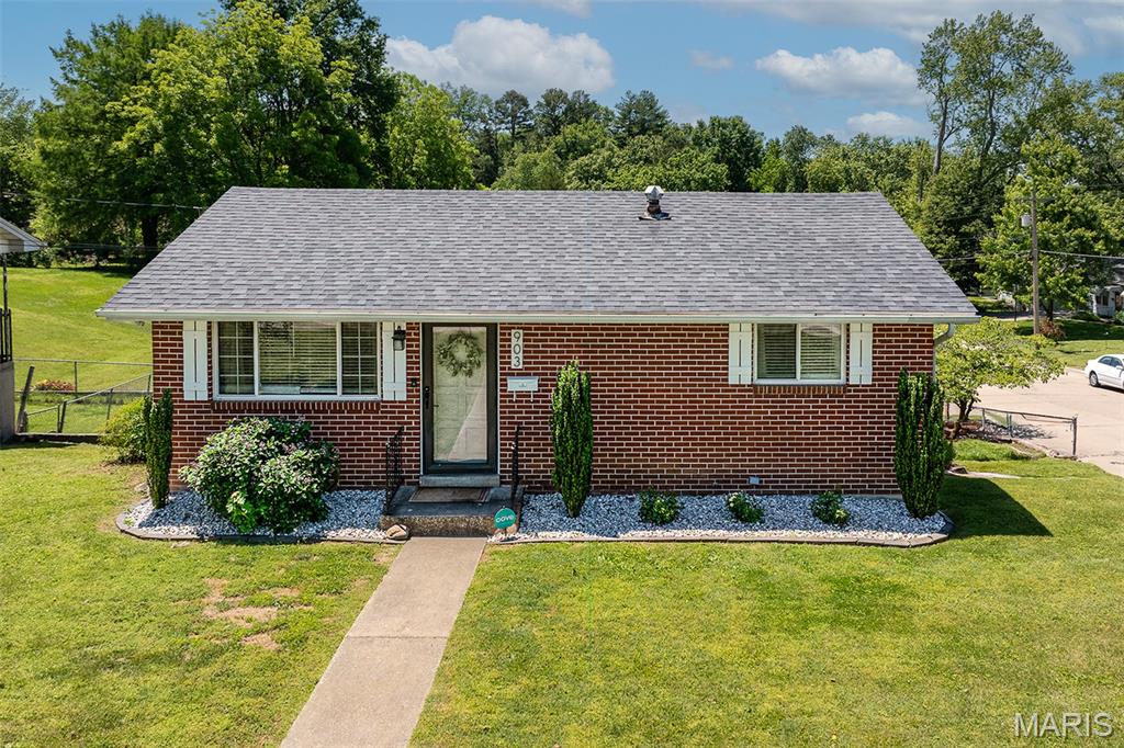 Charming all brick home in the heart of Jackson offering comfort, character, and plenty of entertaining space. This 2 bedroom, 1 bathroom home features a beautifully updated interior with new kitchen flooring, updated kitchen countertops, and a freshly renovated bathroom. The main level living room showcases original hardwood floors along with a built in electric fireplace that adds a cozy touch to the space.

Downstairs, the finished basement provides additional living and entertaining space complete with a newly built in bar, perfect for hosting guests or relaxing at home. The basement also offers potential for a third bedroom, adding even more flexibility and value to the home. Just outside the basement door, you’ll find a screened in porch that creates even more room to entertain or enjoy a quiet evening.

Additional updates include a newer roof and new screen, both installed around 3 years ago, along with new kitchen appliances including the oven and built in microwave. Outside, you’ll appreciate the fenced in backyard that offers privacy and space for pets, kids, or gatherings. The home also features a built in dog kennel tucked beneath the stairs and a 1 car garage for added convenience. This property combines charm, functionality, and thoughtful updates all in one package.