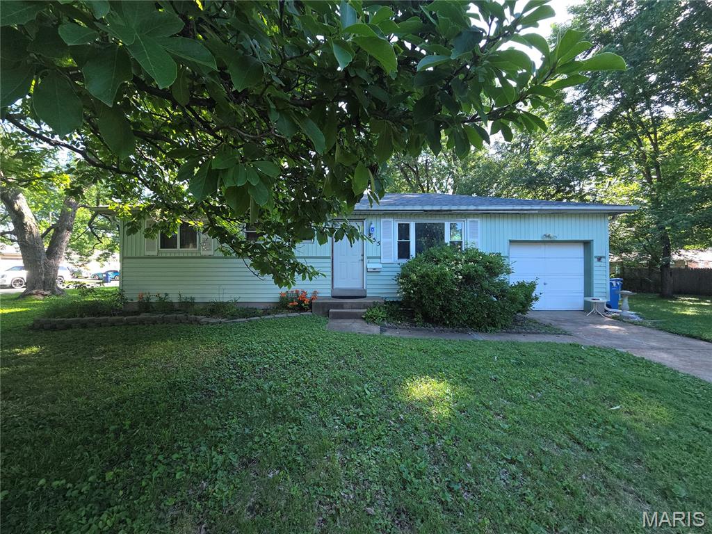 Introducing 855 Lilac Drive, a well-maintained 3-bedroom, 1.5-bath ranch situated on a beautiful corner lot in Florissant. Offering a functional floor plan and solid bones, this move-in ready home presents an excellent opportunity for buyers looking to build equity through cosmetic updates and make it their own. The main level features hardwood flooring throughout much of the home, a spacious living area, and an updated kitchen with refreshed cabinetry and ample storage. The partially finished lower level provides additional living space ideal for a recreation room, home office, workout area, or flex space. Outside, you’ll find a generous yard, mature landscaping, and a unique koi pond that creates a peaceful outdoor retreat. Numerous improvements have been completed over the years, reflecting the pride of ownership throughout the property. Conveniently located near shopping, restaurants, parks, and major commuter routes, 855 Lilac offers a rare opportunity to personalize a well-cared-for home without taking on a major renovation project. Property is being sold as-is and is subject to lender approval of the short sale.