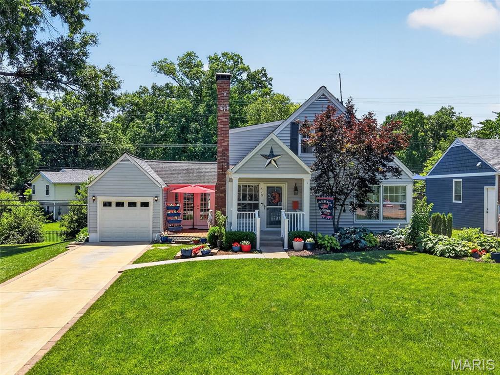 Charming Kirkwood cottage full of character and warmth! This 3-bedroom, 2-bath home offers 1,656 square feet of inviting living space with timeless appeal and modern conveniences. Step inside to find beautiful wood flooring, a spacious living room centered around a cozy gas fireplace, and abundant natural light throughout.

The thoughtfully designed floor plan features two main-level bedrooms and a private upper-level primary suite, creating flexible living arrangements for a variety of lifestyles. The kitchen is equipped with stainless steel appliances, Caesarstone Quartz countertops, custom backsplash, and luxury vinyl plank flooring. The adjoining flex space can easily serve as a dining room, home office, sitting area, playroom, or a combination of a few.

Step outside to enjoy a beautifully maintained gardening space alongside an open backyard area, offering the perfect balance of charm, relaxation, and room for outdoor entertaining. The walk-out basement offers excellent storage and future finishing potential, while the attached one-car garage and driveway provide convenient parking.

Located within the highly rated Kirkwood School District and just minutes from shopping, dining, parks, and all that Kirkwood has to offer, this charming home blends comfort, character, and location into one exceptional opportunity. Don't miss your chance to make this Kirkwood gem your own! Some notable updates include: kitchen and dining room remodel (2022), asphalt removed and replaced with concrete driveway (2018), added stainless steel appliances (2015), converted wood burning fireplace to gas (2015), replaced carpeting upstairs and replaced main floor bathroom flooring (2021), partial remodel of main floor bathroom (2021), and installed new furnace (2016). Seller is willing to remove any of the raised garden beds and plant grass.