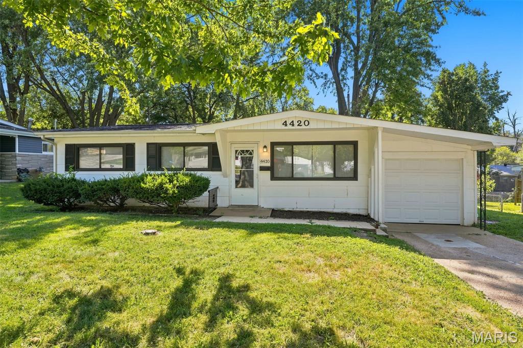 Welcome to this well-maintained 3-bedroom, 1-bathroom single-story home offering a comfortable and functional layout. The spacious living area provides a welcoming space for relaxing or entertaining, while all three bedrooms offer flexibility for family, guests, a home office, or personal use. Enjoy the convenience of an attached garage and a generous backyard, creating additional space for outdoor activities and gatherings. Located in a convenient St. Louis County area with easy access to shopping, dining, schools, major roadways, and everyday amenities.
