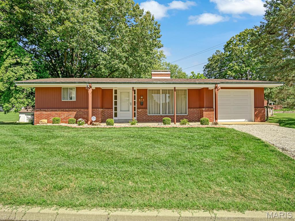 Opportunity awaits with this Belleville property offering endless potential and a unique combination of space, land, and additional parcels. Situated on five parcels and 2.7 acres total, this property provides room to spread out and explore a variety of possibilities.

The home features two main-level bedrooms, a full bathroom, a comfortable living room, and a kitchen with a breakfast bar and dedicated dining area. The walk-out basement is largely unfinished, providing a blank canvas for future expansion, but does include a finished bathroom.

Outside, you'll find a one-car garage along with several additional parcels that add significant value. One parcel consists of the former railroad right-of-way, while another includes a concrete block structure and storage shed.

Behind the home are two concrete pads where mobile homes were previously located. Electric, water, and sewer services are available, creating additional opportunities for future use.

This property is being sold AS-IS and will require updating and repairs, making it an excellent option for investors, developers, or buyers looking to put their own vision into a property with substantial acreage and potential.