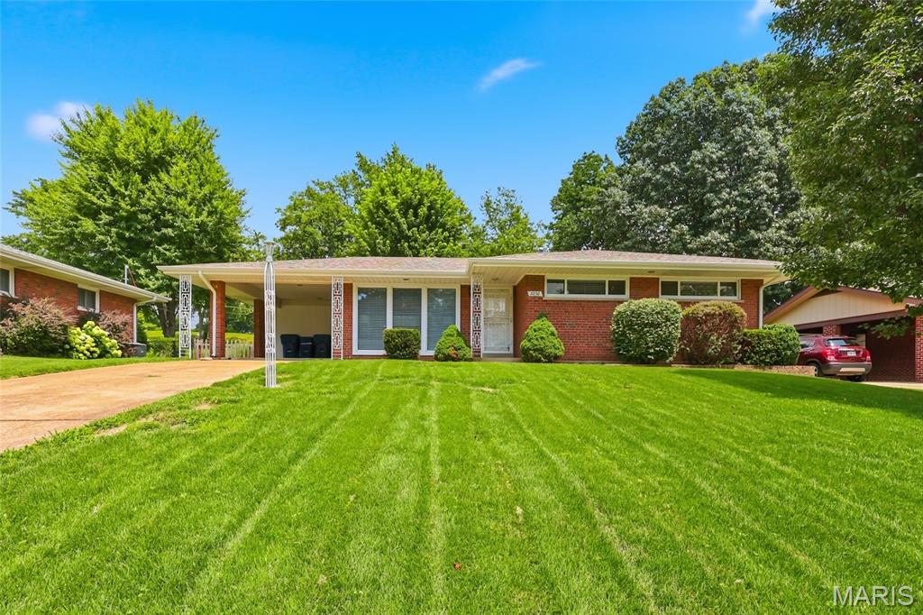 Don't miss this charming ranch home in the heart of Lindbergh School District! Fall in love with this beautifully maintained 3-bedroom, 1.5-bath ranch offering the perfect blend of comfort and entertaining. Gleaming hardwood floors, large picture windows, and abundant natural light create a warm and inviting atmosphere throughout the main level. The home features a spacious formal living room and dining room, along with a modern eat-in kitchen ideal for everyday living and entertaining. The primary bedroom includes a convenient private half bath, while two additional bedrooms and a full hall bath complete the main floor. Step out from the dining room onto a concrete patio overlooking the well-appointed backyard—perfect for relaxing, gardening, or hosting family and friends. The finished lower level provides exceptional additional living space, including a recreation room, family room, dedicated home office space, and a versatile bonus room that can serve as guest sleeping quarters. A half bath, laundry area, and utility room add even more convenience and functionality. This wonderful home offers space, character, and an unbeatable location. Your new home—and memories await!