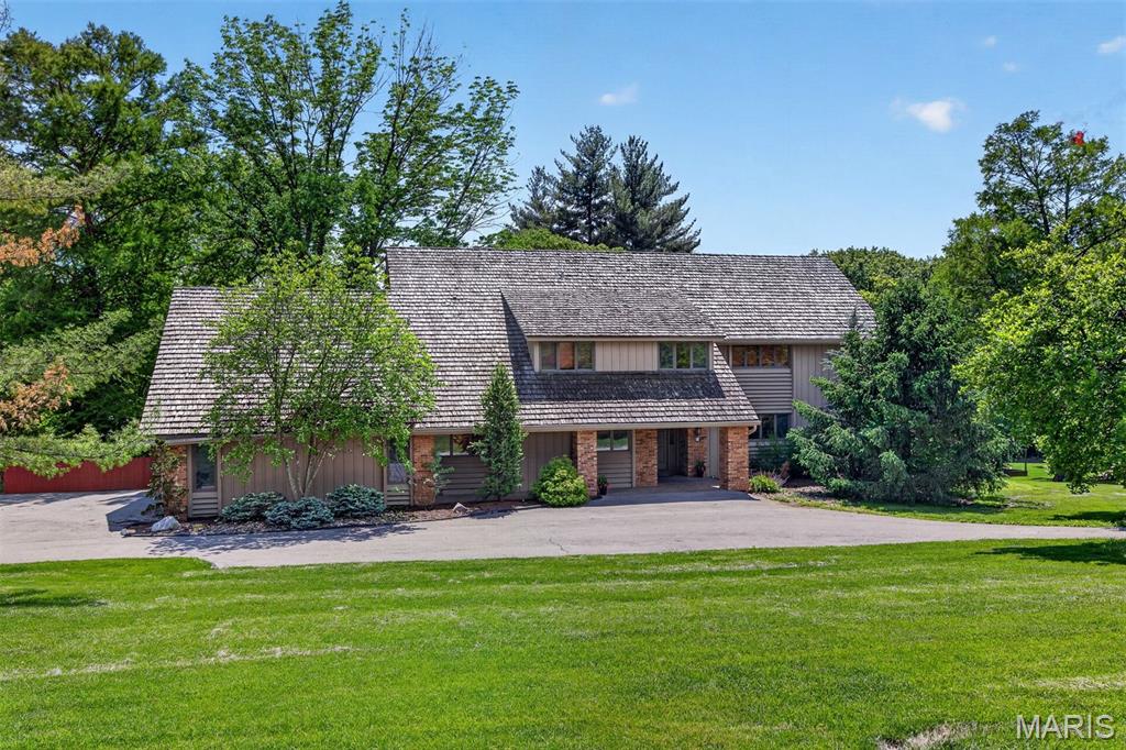 Fabulous New Price! Stunning horse property in the highly sought-after Kirkwood School District—offering a rare blend of lifestyle, land, and opportunity. Set on 3 picturesque acres with direct access to Bridle Trails, this property is ideal for horses, ponies, or simply enjoying the space and privacy surrounded by 50 acres of neighboring acreage and 3-acre minimum zoning. The Colorado contemporary home, designed by Ted Christner, showcases soaring vaulted ceilings, open living spaces, and a warm, rustic aesthetic. Sun-filled main living areas feature southern exposure with sweeping views of the property. The updated kitchen and main-level primary suite combine comfort with modern style, while the great room and breakfast area create inviting spaces for everyday living.  The 2nd floor has 3 very large bedrooms & 3 baths plus bonus room off one of the bedrooms that could be used as storage or a workout room. The walkout lower level is designed for entertaining and relaxation, complete with a spacious game room, custom walk-behind bar, wine cellar, exercise area, half bath, and abundant storage. 
Outdoor living is just as impressive, with a deck, screened porch, and patio overlooking the grounds. With over 5,500 square feet of total living space, this property also presents a rare opportunity—move in and enjoy as-is, or take advantage of the expansive setting to build your dream home in an exceptional location. Hurry, before it's too late!
