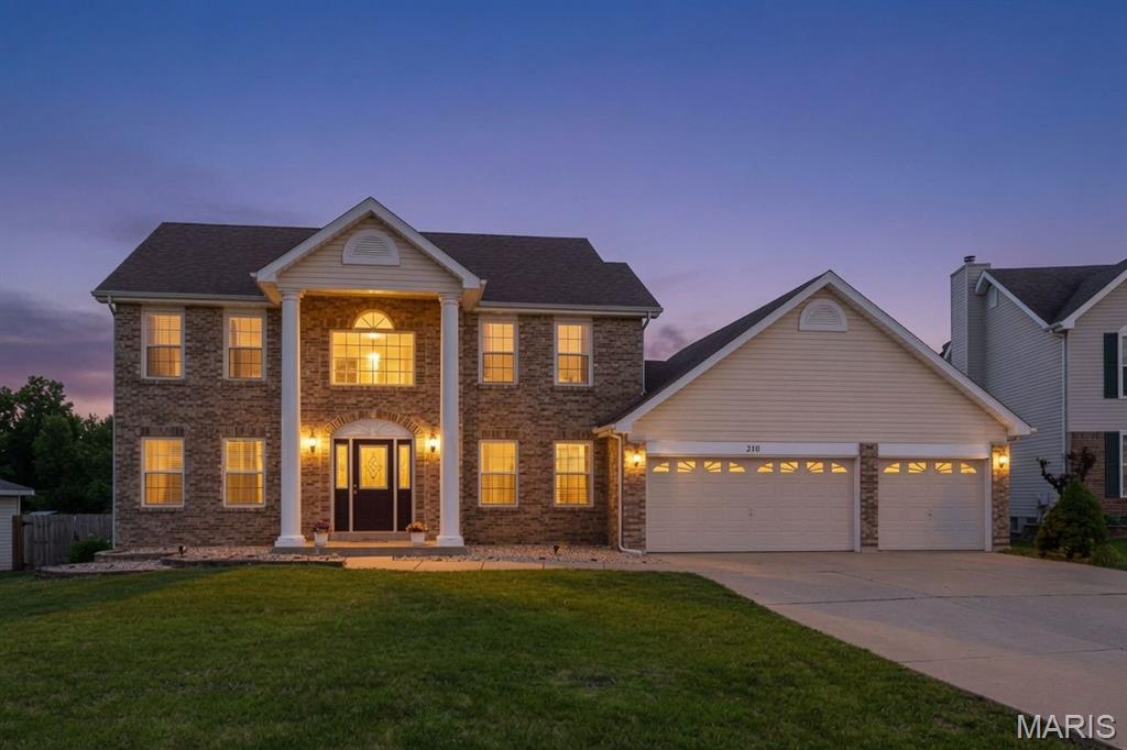 Beautiful two-story home with 3-car garage and expansive fenced backyard perfect for play, pets, and outdoor living. You are greeted with a charming front porch with stately pillars opens into a spacious foyer accented by rich wood flooring. To one side, a private den with French doors offers the ideal work-from-home space, while a formal dining room sits on the other—ready for gatherings and celebrations. The inviting great room features a cozy gas fireplace and a bright bay window, flowing seamlessly into the breakfast room and kitchen. The breakfast room’s bay walkout leads to a large deck, and the kitchen offers a center island, stainless steel appliances, and an upgraded gas stove. A generous main-floor laundry room sits conveniently off the kitchen. Upstairs, the T-shaped staircase opens to a cozy loft, perfect for reading or relaxing. The spacious primary suite impresses with a vaulted ceiling and a luxurious private bath. Three additional bedrooms and a second full bath complete the upper level. The full basement offers partially finished space with endless potential. The huge level backyard is ready for outdoor fun. Fresh paint and brand-new carpeting throughout make this home truly move-in ready.