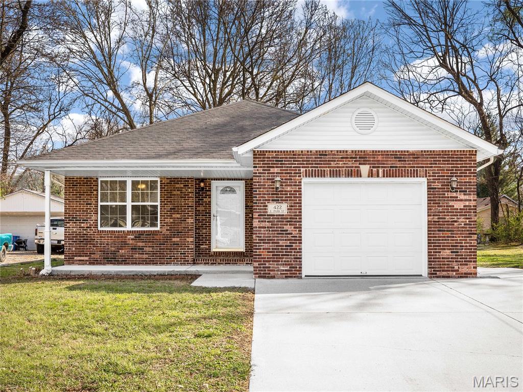 Lovely, two-bedroom home with the convenience of one-floor living. This property offers an open floor plan with a spacious, 19x13 living room, a 21x8, eat-in kitchen, a convenient laundry/mud area adjacent to the garage, and plenty of natural light. PLUS, the .29 acre, double lot provides ample space for outdoor living, gardening or playing in the yard! New roof to be installed in late April. Located in the heart of Edwardsville, this unique and attractive property is a short walk to the library and downtown restaurants and shopping. Showings begin on Friday, April 10! Open House: Saturday, April 11, 12-2PM. Buyer to verify all MLS data including but not limited to square feet, measurements, features, exemptions/taxes, schools, etc.