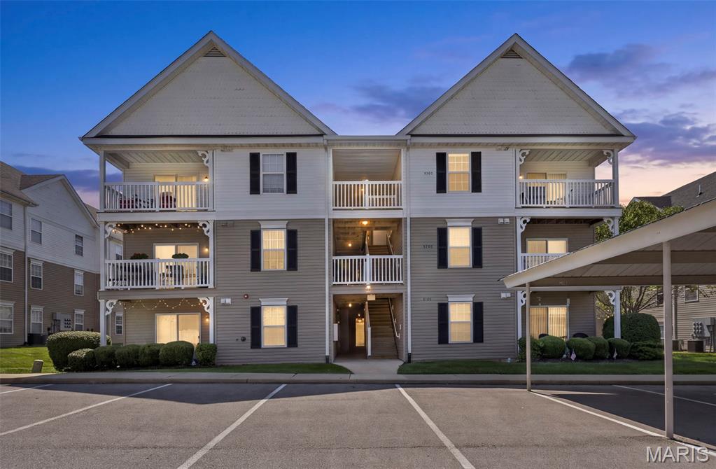 Welcome home to this beautifully updated 2-bedroom, 2-bath condo in the ideally located Springhurst Terrace community! This private corner unit offers main-floor living with no stairs and convenient access to a covered parking space. The open floor plan features a bright living area, separate dining space, and an updated kitchen with granite countertops, stylish backsplash, stainless steel appliances, and breakfast bar. The spacious primary suite includes a walk-in closet and private full bath. Enjoy updated flooring, neutral décor, in-unit laundry, additional storage, and a covered patio perfect for relaxing outdoors. Community amenities include a swimming pool, playground, sport court, walking trails, and fenced dog park. Monthly condo fees cover water, sewer, trash, snow removal, and more. Conveniently located near Hwy 64/40, shopping, dining, and everyday conveniences. Low-maintenance living in a highly sought after O'Fallon location!