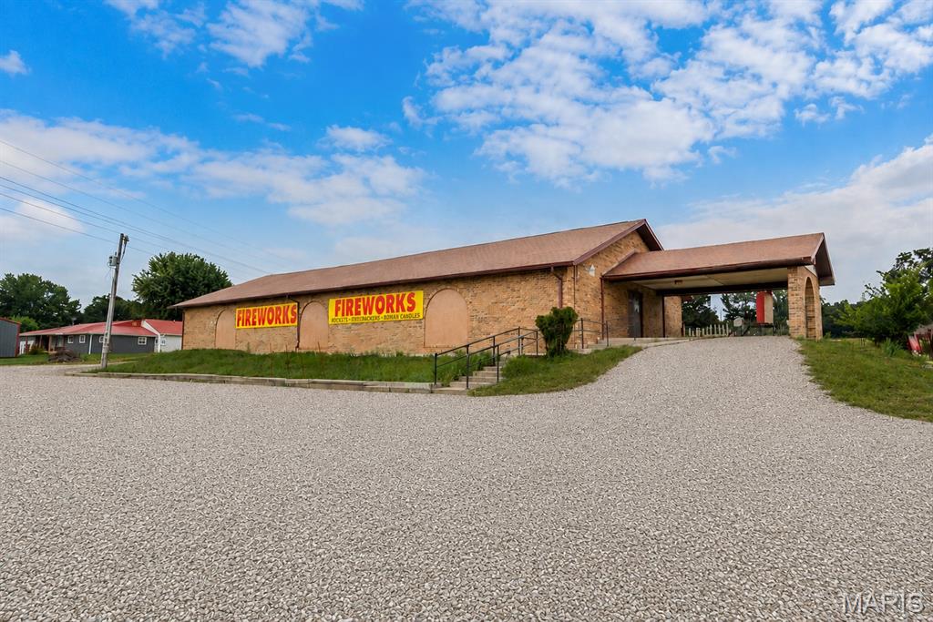 EXCEPTIONAL COMMERCIAL OPPORTUNITY WITH I-44 FRONTAGE & UNMATCHED VISIBILITY!
Position your business for success with this approximately 7,200-square-foot solid brick commercial building offering exceptional Interstate 44 frontage and incredible visibility! Located in a high-traffic area next to the Lebanon OTC Campus, this property provides exposure to thousands of vehicles traveling I-44 every day, making it an ideal location for a business that wants to be seen. The property offers a unique combination of location, size, visibility, parking, and versatility that is hard to find. Previously utilized as a church and currently operating as a profitable fireworks retail business, the building offers a flexible layout that can accommodate a wide variety of potential uses. Whether you're looking for a retail location, restaurant, office, showroom, event center, entertainment venue, service business, or investment property, this building provides an excellent starting point for your vision, subject to zoning and applicable regulations. The solid brick construction provides a strong commercial presence, while the spacious interior and ample parking add to the functionality of the property. The highly recognizable location along I-44 provides the kind of exposure that can be difficult and expensive to create elsewhere. For an owner-user, this is an opportunity to establish your business in a location where customers can easily find you. For an investor, the property offers flexibility and the potential to capitalize on a highly visible commercial location. If visibility matters, location matters—and this property delivers both! Bring your business plans, investment ideas, or redevelopment vision and take advantage of this rare opportunity to own a substantial commercial property with I-44 frontage and outstanding exposure.
Properties offering this combination of size, visibility, location, and flexibility are hard to find. Schedule your private showing today and discover the possibilities!