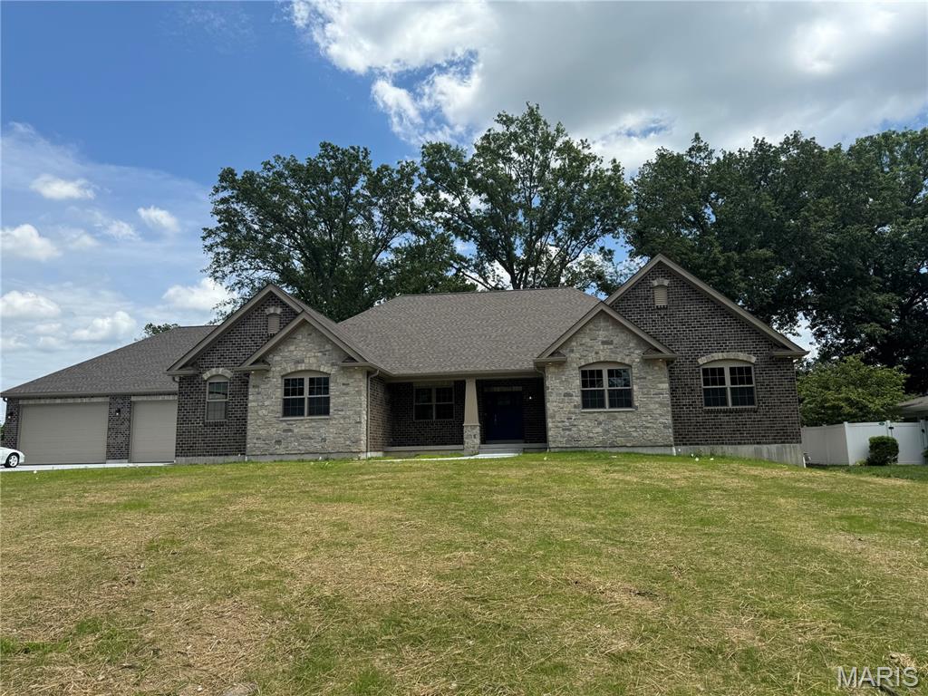TBB Custom Home.    This home or another custom home can be built on this awesome lot over a half acre in Lindbergh School District.   This approximately 3000 sq ft ranch home with awesome open living has 3 bedrooms, 3 full baths and 1 half bath.   Stunning U shaped kitchen with Huge island, that opens straight thru to the dining room and great room, all completely open.    Main bedroom suite, with main bath has a large walk-in shower, free standing tub and his and her walk in closets.   Both bedrooms 2 and 3 have private baths and the main living area has a 4th private powder room.   Home also has a separate private office in front and an awesome hearth room in the rear.    3 car side entry garage and the ability to add a finished lower level in this 9' tall basement.   Again this or another home/floor plan can be designed custom to fit your lifestyle.