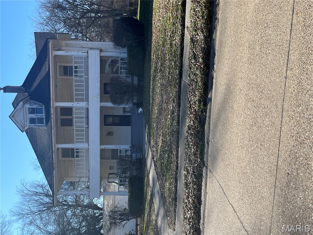 If you need a very large home at a reasonable price, this is the perfect place for your family. A total of 7 bedrooms, three bathrooms with more storage than you can imagine and plenty of flex space for everyone. This home had unbelievable character, once you walk through the door you immediately feel at home. A newer two car garage has been added and there are two spacious outbuildings in the huge yard. Beautiful old trees provide shade all around the house and the double front porches, one upstairs and one down are perfect for children to play on or adults to sit and swing, sip your coffee and read a book. Let's take a look at this 1913 beauty!