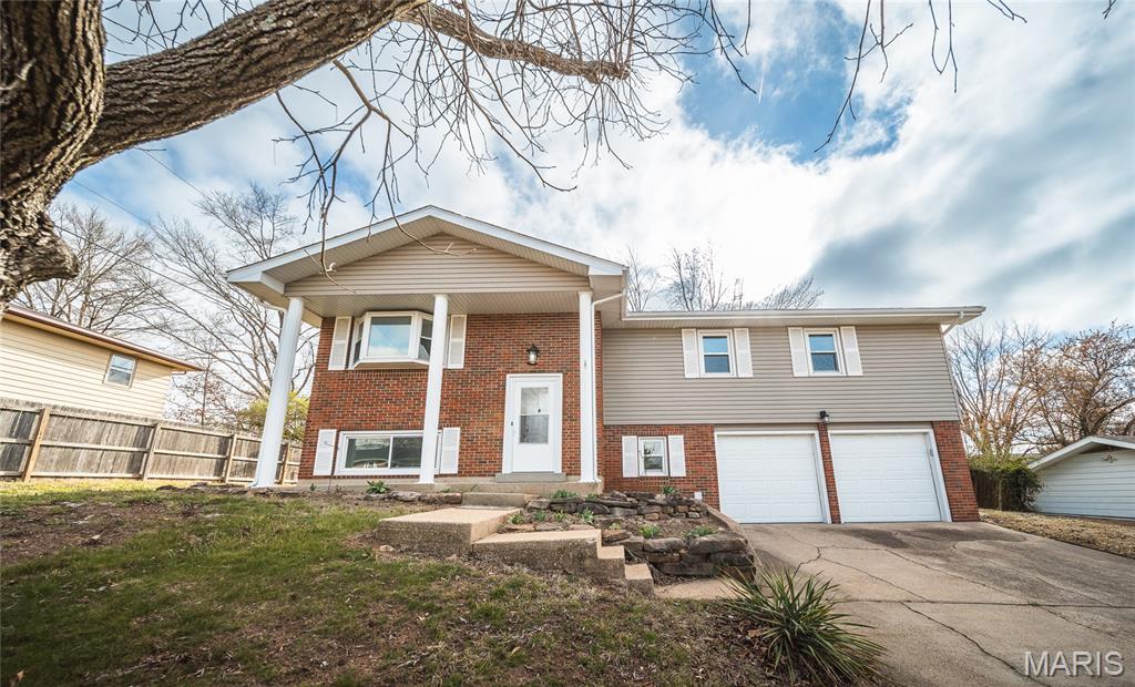 Beautifully Remodeled 4 Bed - 2.5 Bath Split-level home in the Heart of Rolla. Welcome home to this stunning, updated residence. Offering modern comfort and style throughout. Step inside to discover brand-new luxury vinyl plank flooring, a completely updated kitchen w/new cabinetry, countertops, and new stainless appliances. Fully renovated bathrooms, featuring contemporary finishes. This spacious home includes 4 bedrooms, 2 full baths, and a half bath in basement. Basement is completely finished perfect for additional living space, a family room, or home office. Backyard is ideal perfect for pets, play, and entertaining. A two-car garage provides ample parking and storage. Located in the heart of Rolla, this move-in readyhome offers convenience, comfort, and modern living all in one. Don't miss your chance, call today to make this beautiful home yours!