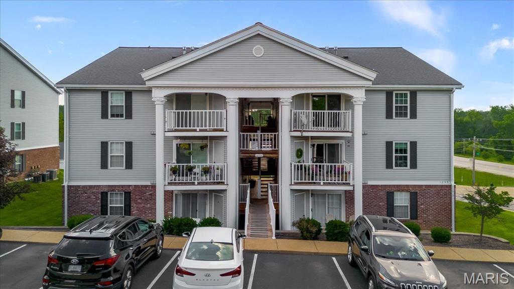 Beautifully updated 2 bed, 2 full bath condo in the heart of Chesterfield offering 868 sq ft of comfortable and functional living space! This light-filled home is located on the top level of the building and features vaulted ceilings, a beautifully updated kitchen with great functionality, including newer countertops, sink, fixtures, under cabinet lighting, water filter, and stainless steel backsplash, along with an open layout perfect for everyday living. Additional major updates include a new HVAC system & water heater, and main water shut off & pressure valve (2025). The spacious primary suite includes a private en suite bath, while the second bedroom and full bath provide flexibility for guests, family, or a home office. Enjoy the convenience of main level washer hookups, two covered parking spots, and a private balcony ideal for relaxing outdoors. Affordable utility costs make this home inexpensive to heat and cool. Located close to schools, shopping, dining, and major highways, all within a wonderful school district!