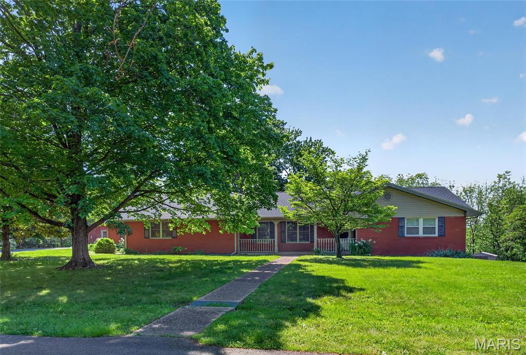 Tucked away in a quiet private subdivision in the heart of Cape Girardeau, close to schools, hospital, shopping, and more, this all-brick ranch nestled on approximately one acre lot, offers space,  flexibility, privacy, and SO much potential.
Not one but two primary suites, for a total of four bedrooms and three baths on the main level.  Formal and informal living areas, main level laundry, enclosed back porch, and spacious kitchen with island.
The walk-out lower level has a full apartment for extended family, guests or potential rental income.  It even has it’s own private driveway
Additional brick storage shed/garage for your mowers, lawn tools, or toys.
With an open mind, vision, and imagination, this has fantastic possibilities

Don’t let it get by you!