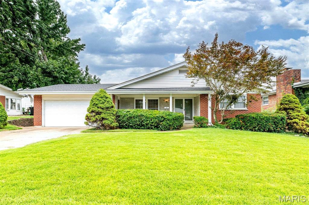 Welcome to 1610 St. Anthony Lane! This inviting 3-bedroom, 2-bath ranch blends thoughtful updates, original character & plenty of potential to make it your own. A brick-accented exterior, covered front porch & attached 2-car garage create a welcoming first impression. Inside, abundant windows fill the home with natural light, while beautiful wood floors flow through much of the living space. The updated kitchen features stainless steel appliances, solid-surface countertops, modern lighting & stylish vinyl plank flooring. One full bath has been refreshed with a walk-in shower, while the second retains charming vintage tile & a tub/shower combo. Sliding glass doors lead to a concrete patio & spacious, level backyard ready for your vision—garden, entertaining space, pool or more! With no HOA, the possibilities are wide open. An unfinished basement with exterior walk-down access & built-in storage shelving offers even more flexibility. Move in, make it yours & enjoy!