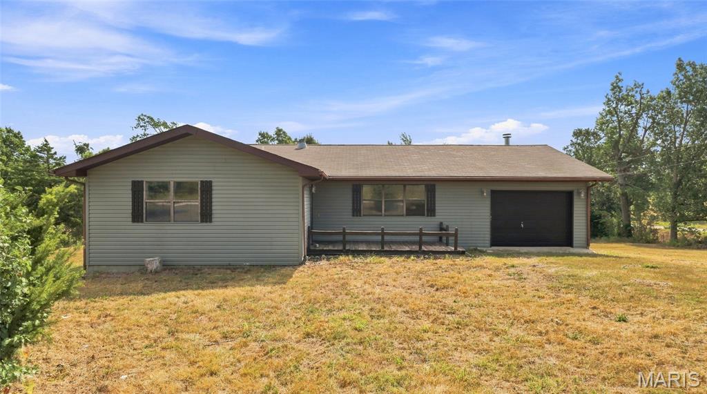 Discover the potential of peaceful country living with this inviting 3-bedroom, 2-bathroom home in Plato, Missouri. Whether you’re searching for a place to call home or looking to add to your investment portfolio, this property offers a great combination of comfort, convenience, and opportunity—all in a quiet rural setting. Step inside to a welcoming living room where large windows fill the space with natural light, while a wood-burning fireplace creates the perfect spot to relax on cool Missouri evenings. Laminate flooring offers easy everyday maintenance and flows throughout the home, creating a comfortable and functional living space. The spacious kitchen provides plenty of room for cooking and gathering, complete with ample workspace and a breakfast bar that’s ideal for quick meals, morning coffee, or casual entertaining. With three bedrooms and two bathrooms, the layout offers flexibility for family, guests, a home office, or rental potential. Outside, enjoy the slower pace and privacy of a quiet country setting while still being conveniently located approximately 10 minutes from the Fort Leonard Wood South Gate. This location makes the property especially appealing for those wanting easy access to Fort Leonard Wood without giving up the benefits of rural living. With its convenient location, comfortable layout, and investment potential, this Plato home is ready for its next chapter. Schedule your private showing today and come see the possibilities for yourself!