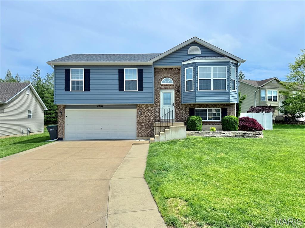 Welcome to this beautifully maintained split level home split-level home in the desirable Twin Pines subdivision in Cedar Hill- featuring a brand new roof, siding, and gutters all replaced within the last 6 months! This major exterior upgrade offers peace of mind and great curb appeal from day one. Situated on a spacious corner lot, this 3 bed, 2 bath home offers approximately 1,500+ sq ft of comfortable living space with a functional and inviting layout. Step inside to a bright and open main level featuring a spacious living room with a bay window that fills the space with natural light. The kitchen and dining area flow seamlessly together, complete with stainless steel appliances and easy access to the backyard—perfect for everyday living and entertaining.  The primary suite is generously sized with ample closet space, while two additional bedrooms provide flexibility for family, guests, or a home office. The finished lower level offers a large family room with potential for additional sleeping space, plus extra storage throughout. Enjoy outdoor living with a large fenced in yard, deck, and additional space for recreation or gatherings. The attached 2-car garage and extended driveway provide plenty of parking and convenience.  Located in the Northwest School District and USDA eligible area, this move-in ready home combines space, comfort, and value—schedule your showing today!