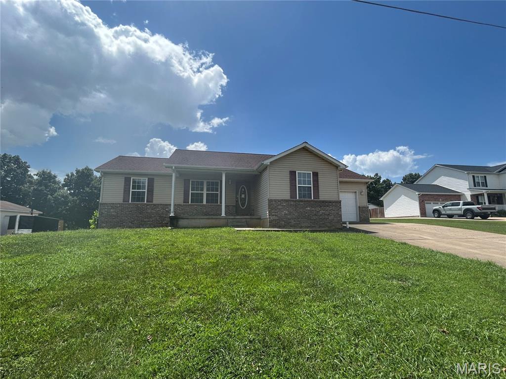 Rare opportunity to own a 3-bedroom, 3-full-bath ranch situated on approximately 1.78 acres with the property extending all the way to the Big River! This spacious property offers solid bones and plenty of potential but will need updating and some rehabilitation, making it an excellent opportunity for investors, rehabbers, or buyers looking to create their own vision. The home features a large, open kitchen with an abundance of oak cabinetry and plenty of room for gathering, along with a partially finished basement offering additional space and potential. Outside, the expansive backyard provides plenty of room to enjoy the acreage and take advantage of the property's unique river access and setting. With three full baths, generous living space, substantial acreage, and a rare riverfront backdrop, this property offers tremendous potential for the right buyer. Property is being sold as-is; seller will make no repairs. Utilities are currently in process.