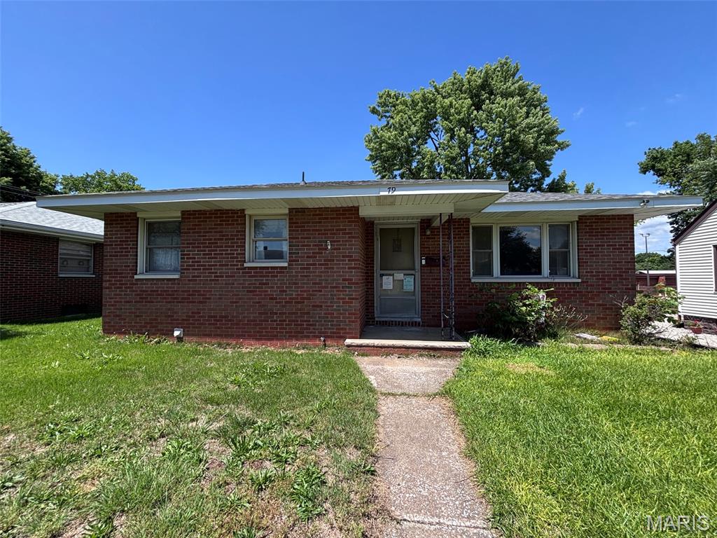 Come take a look at this conveniently located full brick ranch for under $80,000!! This home offers 2 bedrooms, updated kitchen and bathroom, full basement that could easily be finished to add extra living space and a large back yard with a shed for extra storage. Selling AS-IS.