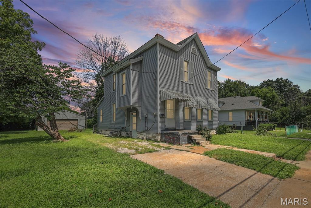 Large 2 story home includes 3 large bedrooms, and 1 full bath upstairs. Main floor includes nice sized kitchen with island, large living and dining rooms, enclosed back porch. Also newer windows, detached 2 car garage/workshop. Home being sold as is condition only. No repairs or city occupancy permit provided.