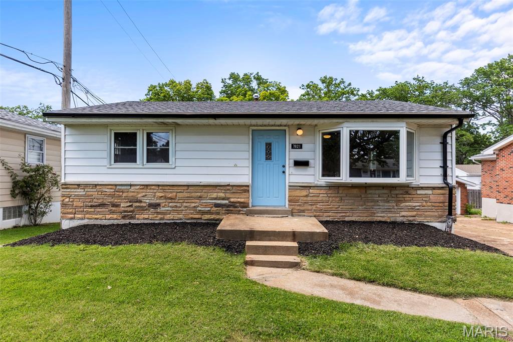 As our girl Miley Cyrus once said, "it's all about the Cly-mer". We can almost see it...that dream(home) you're dreaming...with a brand new kitchen & roof ;) Welcome to 7821 Clymer, a beautifully renovated 3 bed, 1 bath ranch in the heart of South City that proves homes built in 1955 can still steal the show. From the moment you pull up, the curb appeal sets the tone with a charming baby blue front door, manicured lawn + the kind of house that makes you slow down just a lil’ while driving by. Step inside and find brand-new hardwood flooring flowing throughout the main level, fresh paint, updated trim, and natural light pouring through the oversized bay window in the living room. The dining area offers plenty of room to gather and opens directly into the fully renovated kitchen featuring white cabinetry, black granite countertops, stainless steel appliances, ample storage + a trendy hexagon mosaic backsplash. Every detail has been thoughtfully updated, making this space as functional as it is beautiful. All three bedrooms feature hardwood flooring, large windows, and generous closets. One bedroom connects directly to the primary suite, making it the perfect nursery, home office, reading room, or bonus flex space depending on your needs. The hall bath has been completely updated while keeping the classic hex tile flooring, a shower/tub combo, new vanity, and timeless finishes. Downstairs, the finished lower level offers even more living space with fresh paint, updated flooring + new glass block windows. Whether you need a rec room, home gym, office or movie night headquarters, this space is ready for it. The updates don’t stop at what you can see. Major improvements include a new roof (2025), new water heater, updated plumbing stack and domestic water lines, electrical updates, new fixtures throughout, duct cleaning and servicing, gas meter relocation, four new double-hung windows, new garage door motor and tracks, and more. The furnace and AC are approximately 10 years old and have been serviced. Outside, you’ll find a fully fenced backyard, oversized concrete patio, and detached garage. Located just minutes from I-55, downtown, sporting events, the airport, and local favorites like Syberg’s, Hatch’d, Stellar Hog, El Catrin, and more, this one makes everyday life easy. Safe to say… the hard work has already been done. All that’s left is *moving* in. Keep the faith, baby! Because Clymer is what your home search is all about :) Cheers!