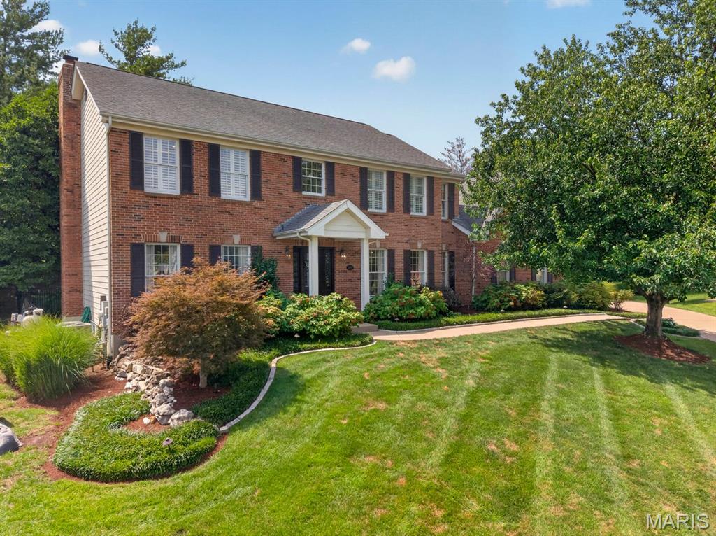 Welcome to this beautifully updated home, perfectly situated on a desirable cul-de-sac in a sought-after Des Peres subdivision. From the moment you arrive, the exceptional curb appeal and wonderful neighborhood setting make a lasting impression.

A welcoming center hall floor plan opens to a gracious dining room on one side and a charming sitting room on the other, complete with beautiful custom cabinetry and inviting finishes. Beyond, the heart of the home awaits—a spacious family room seamlessly open to the updated kitchen, creating the ideal setting for everyday living and entertaining. The kitchen features a large center island, custom cabinetry and upgraded appliances.

Step outside to an incredible outdoor oasis designed for enjoying every season. Just off the kitchen, an inviting outdoor room overlooks the stunning pool, complete with a beautiful water feature. An outdoor grilling area makes entertaining effortless, while a separate tiled pool entry provides exceptional convenience.

The main level also offers a thoughtfully designed mudroom, main-floor laundry, powder room and additional access to the pool area.

Upstairs, four spacious bedrooms and three full baths provide plenty of room for family and guests. The expansive primary suite features an immaculate, newer bathroom, while the secondary bedrooms offer excellent closet space and beautifully updated baths.

The lower level is truly made for gathering, with generous recreation space, a dedicated craft area and plenty of room to relax and lounge—offering far more than you would expect.

An attached two-car garage completes this exceptional home, combining thoughtful updates, beautiful living spaces and extraordinary indoor-outdoor living in a fantastic Des Peres location.