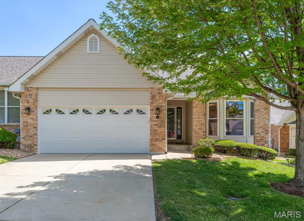 Walk-out, end-unit, finished lower level on cul-de-sac w/two-car attached garage. Deck w/nice view of open common ground. Vaulted living room & separate dining room. Kitchen w/ breakfast rm has bay window. Main floor laundry room. Primary bedroom w/ coffered ceiling, private full bath & walk-in closet. Family room w/gas fireplace. Wood flooring. Stainless appliances. New roof '21, new HVAC '23. Low $290/month condo fee covers property landscaping, roof, siding, gutters, annual termite inspection & snow removal. Showings start 7/7.