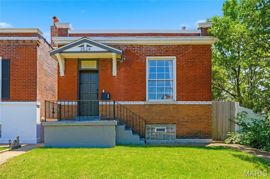 Welcome to this beautifully updated historic home tucked away at the end of a quiet cul-de-sac on a charming cobblestone street in the heart of Tower Grove South. Thoughtfully renovated while preserving its timeless character, this home offers the perfect blend of historic charm and modern convenience. Inside, you'll find original hardwood floors, exposed brick, a restored built-in, and a stunning original fireplace mantel that celebrate the home's architectural heritage. The newly remodeled bathroom, convenient main-floor laundry, and functional mudroom provide the updates today's buyers are looking for, while major systems—just three years old—offer added peace of mind.

Step outside to enjoy the privacy-fenced backyard with an off-street parking pad, creating a private urban retreat. Located in one of St. Louis' most sought-after and highly walkable neighborhoods, you'll enjoy the vibrant lifestyle, local restaurants, neighborhood shops, and historic character that make Tower Grove South such a desirable place to call home.

Historic character, modern updates, and an unbeatable location—this is city living at its finest.
