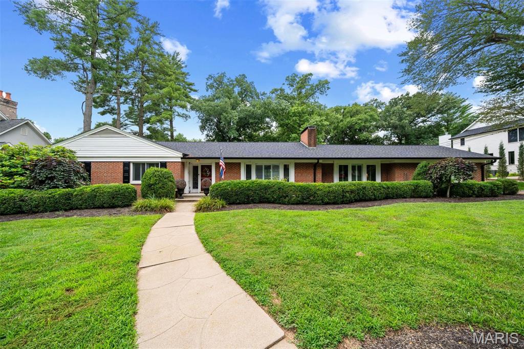 A PICTURE IS WORTH A THOUSAND WORDS...
Experience the tranquility of a ranch-style home on this secluded lane in Ladue. Curb appeal PLUS! Inside, the open floor plan is ideal for entertaining. The newer designer kitchen boasts 2 sinks, two ovens (plus a warming drawer) and a new dishwasher. A gourmet cook's dream with gorgeous granite countertops and custom tilework. But the best is the breathtaking view of the private patio and the awesome gardens. This well maintained 3 bedroom home with 3 full baths features two  fireplaces with gas inserts , a main floor laundry, plantations shutters throughout, sunroom, Simonton windows & Pella Storm doors. The spacious LL has a complete kitchen, custom office, a billiards area (table included!) and a full bath.