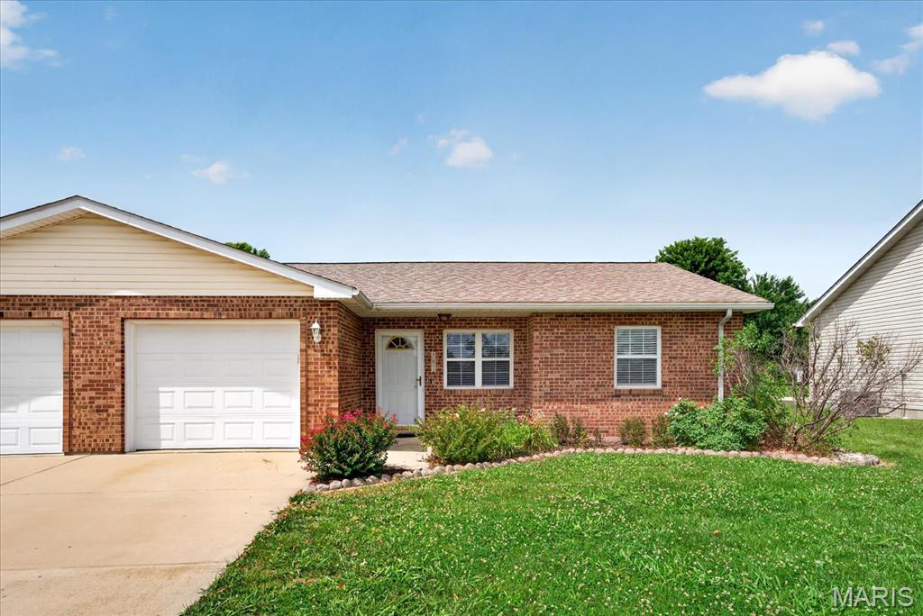 Calling all first-time home buyers, homeowners looking to downsize, or investors looking to add to their portfolio—this could be the opportunity you've been waiting for! Classified as a duplex, this one-story home offers 945 square feet of opportunity and features a functional floor plan with 2 bedrooms and 1.5 baths, including a private half bath in the primary bedroom. The home also offers a comfortable living room with updated flooring, a spacious kitchen and dining area, plus a separate laundry area conveniently located in the utility/components room. Best of all, there are no HOA fees to worry about!  A bonus feature you'll love is the 10' x 12' screened-in porch, complete with a ceiling fan to help keep you cool on warm summer days. This inviting space is the perfect place to relax, unwind, and enjoy your morning coffee while taking in the outdoors without the bugs.  This home is ready for a new owner to bring their vision and creativity and make it their own. Several important improvements have already been completed for the next owner, including a roof replacement in 2020, an updated microwave in 2020, a new hot water heater installed in 2023, updated flooring in the living room, and updates to both bathrooms. The dishwasher is original, and some additional appliances may be desired.  Whether you're looking for an affordable place to call home, a downsizing option, or an investment property with potential, this property offers a blank canvas both inside and out. With 945 square feet to work with, the possibilities are endless for creating the space you've always wanted. Roll up your sleeves, bring your ideas, and transform this property into something special.  Opportunities like this don't come around often—schedule your showing today because this one is expected to go quickly! Who’s ready to unlock the potential at 301 Kaskaskia Drive?  Affordable. Full of potential. No HOA fees. Just waiting for its next owner!