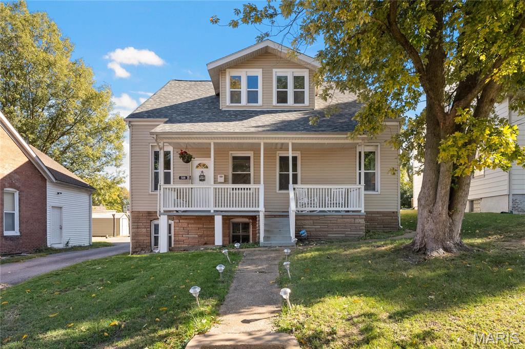 This One is a Must-See!
This beautiful 1 1/2 story home offers the perfect blend of comfort, space, and thoughtful updates throughout. From the moment you arrive, you’ll be welcomed by the inviting covered front porch and a nearly maintenance-free exterior that makes a lasting first impression.

Inside, the impressive 11-foot ceilings create a bright, open atmosphere, enhanced by newer windows, doors, and flooring.  The main floor features a spacious bedroom for convenience and flexibility, while four additional bedrooms upstairs provide plenty of room for family, guests, or a home office setup.

The family room, dining area, and kitchen flow together in an open and inviting layout that’s perfect for everyday living and entertaining. The kitchen offers tons of storage, laminate flooring, solid-surface countertops, and stainless-steel appliances.

An over-height crawl space adds valuable extra storage. Step outside to enjoy a nice deck and a large yard with plenty of space for friends and family to gather.