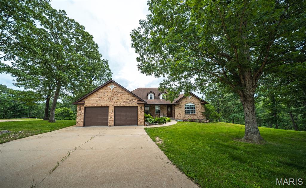 A perfect retreat just outside St. Clair, Missouri, this full brick home offers just under 2,000 square feet on the main level and a fully finished basement. Brand new carpet was also installed in the basement. Tucked down Highway K on a private drive, inside Elk Run Estates, with peace and privacy. Enjoy the best of both worlds, quiet country living just minutes from town and only a short distance to the Meramec River. Outside, the property truly shines with a 40x60 shop perfect for hobbies, storage, or a business setup. The property also has a pool for relaxing and entertaining during the warmer months. With mature surroundings, room to spread out, and a convenient 5-minute drive to town, this property checks all the boxes for space, privacy, and location.