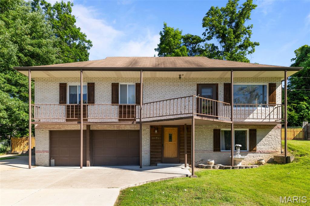 Enjoy peaceful lake views and comfortable living in this well-maintained 3-bedroom, 1.5-bath reverse ranch home. The functional floor plan offers a welcoming layout with spacious living areas and plenty of natural light. Step outside onto the balcony and take in the beautiful lake views—an ideal spot to enjoy your morning coffee or unwind at the end of the day.

The property also features a large yard with ample space for outdoor entertaining, gardening, recreation, or simply enjoying the surrounding scenery. Additional highlights include a single-car garage, public utilities, a newer driveway, newer water heater, and an HVAC system that is less than six years old, providing added value and peace of mind.

All appliances are included with the sale, including the refrigerator, range, dishwasher, washer, and dryer, making the transition to your new home even easier. This home has been well cared for and is in great condition, offering an excellent opportunity for buyers seeking a move-in-ready property with scenic lake views and practical updates already completed. Plus, Seller is providing a 12 month home warranty plan! Property is being sold AS-IS. Seller will make no repairs.