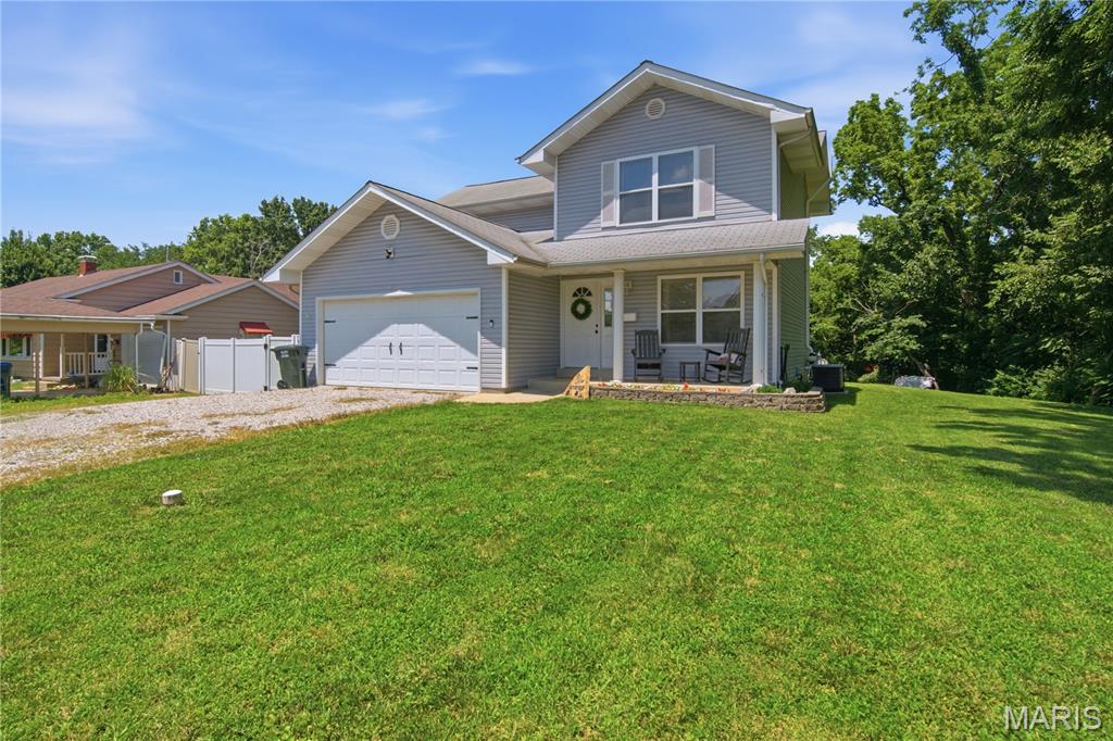Welcome to 619 W Saint Louis Street, a well-maintained 3-bedroom, 2.5-bath home located on a quiet street just outside of historic Columbia. This home is priced competitively in the low 300 range offering fresh gray paint, crisp white trim and doors, as well as many other updates throughout. In the kitchen you'll find beautiful white countertops and a spacious lay out. In the living areas you'll find space for family and friends, with LVP flooring throughout offering style and durability. One of the stand out features of this property is a fully unfinished basement with bathroom rough-in offers excellent potential to expand your living space. Whether you're dreaming of a home gym or a spacious family room, this space offers the possibility to add your personal touch. This home also offers a nice flat, fully fenced backyard—perfect for relaxation, play, or entertaining. Perfectly located within walking distance to downtown Columbia, offering the perfect blend of small town charm and big city amenities, with excellent boutiques, numerous parks and trails, and a thriving restaurant scene. Don't miss your chance to own this move in ready gem with tremendous potential. Schedule your showing today and experience all this property has to offer! Agent Related