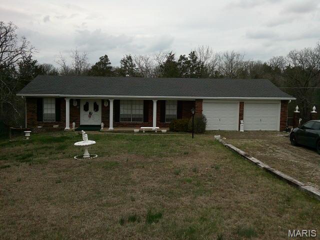 FIXER UPPER on 2 Lots at 1559 Berry Dairy Road in unincorporated De Soto. Sunrise School District. Seller will need money from a closing to remove some personal property. Possession at closing will not occur. Buyer (investor) can assume a lot of items will remain in home. Buyer (investor, contractor, etc.) is the type for this home. Cash Buyer needed! Home could be fixed up & sold. Use additional lot to build a spec? 24-hour notice to show. Call with any questions. Sale to be AS-IS. Any inspections will be for Buyer's knowledge. Roof is 4 years old (per seller). Garage doors are 4 years old (per seller). Drive by, walk around before calling. Subject to an Easement.