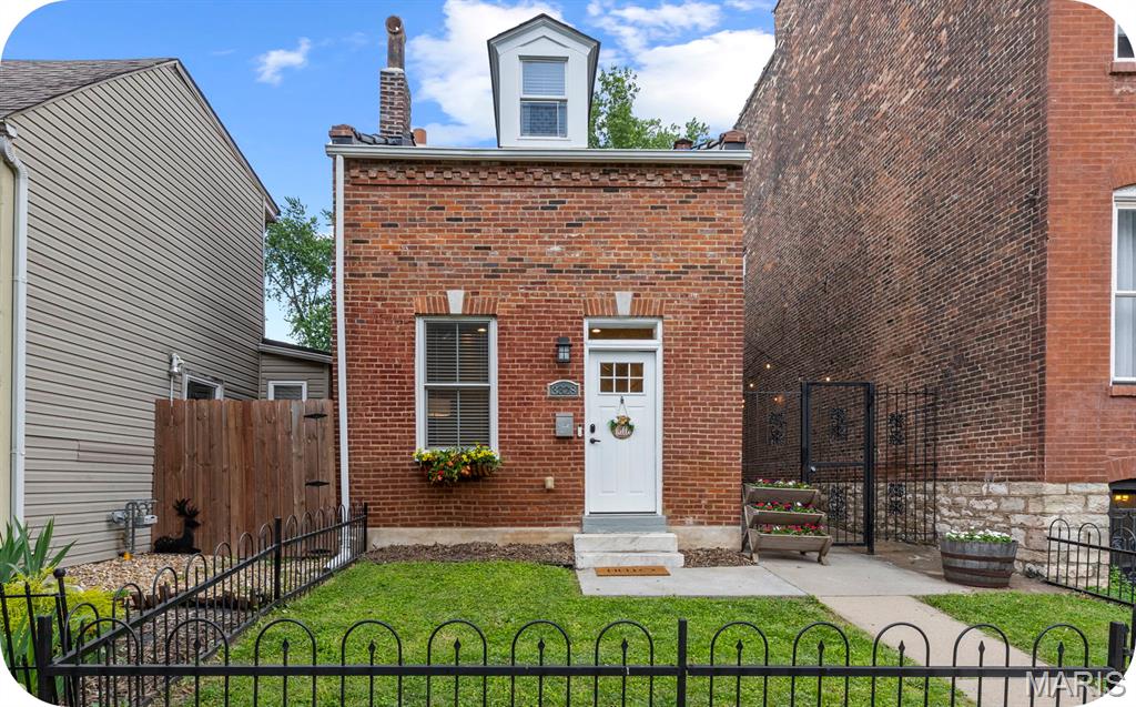 Welcome to this custom Benton Park Beauty! Step inside the luxurious living room opening directly into a designated dining area and beautifully updated kitchen equipped with soft close cabinetry, granite countertops and energy efficient appliances. Half bath and large laundry room/mud room round out the main level. The show-stopping double staircase leads up to a large primary suite with walk-in closets and storage galore along with an ensuite bathroom that's sure to impress  2 additional bedrooms, and an updated full bathroom. The other staircase leads to a separate room perfect for a designated office, gaming room or 4th bedroom. Outside offers a 2 car garport, privacy fence and a lovely side courtyard. A perfect mixture of thoughtful updates and historic charm, this home has it all. Property is conveniently walkable to coffee shops, restaurants and parks as well as quickly accessibly to highways and shopping. Schedule your tour today!