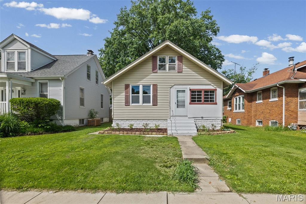 Full of charm and character, this inviting 2-bedroom, 1-bath home features an updated bathroom, hardwood floors throughout most of the home, a full unfinished basement, and a fenced backyard. The spacious finished upstairs room offers endless possibilities and can be used as a bonus room, office, playroom, or additional living space. The home offers a detached 2-car carport with convenient alley access parking with a fenced in backyard.
