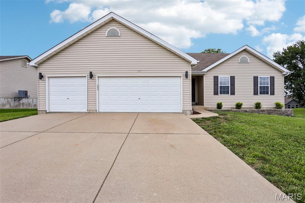 Open House Sunday 1-3 featuring KONA ICE!!!  Welcome home to this beautifully updated 3-bedroom, 2-bath ranch in the heart of Wentzville! From the moment you step inside, you'll appreciate the modern updates, including granite countertops, updated flooring throughout the main living areas, brand-new carpet in all bedrooms, and mostly fresh paint throughout the home. The spacious floor plan offers comfortable everyday living and includes a partially finished lower level with a possible 4th bedroom, home office, workout room, or flex space to fit your needs. The oversized 3-car garage provides plenty of room for vehicles, storage, hobbies, and outdoor equipment. 
Step outside to enjoy the large backyard, offering endless possibilities for entertaining, gardening, pets, or simply relaxing. Conveniently located near major highways, shopping, dining, parks, and highly rated Wentzville schools, this home combines comfort, convenience, and value.  Wentzville continues to be one of the fastest-growing and most desirable communities in the area, offering excellent amenities, community events, recreational opportunities, and easy access to everything the St. Louis region has to offer. Don't miss your chance to make this move-in-ready home yours!