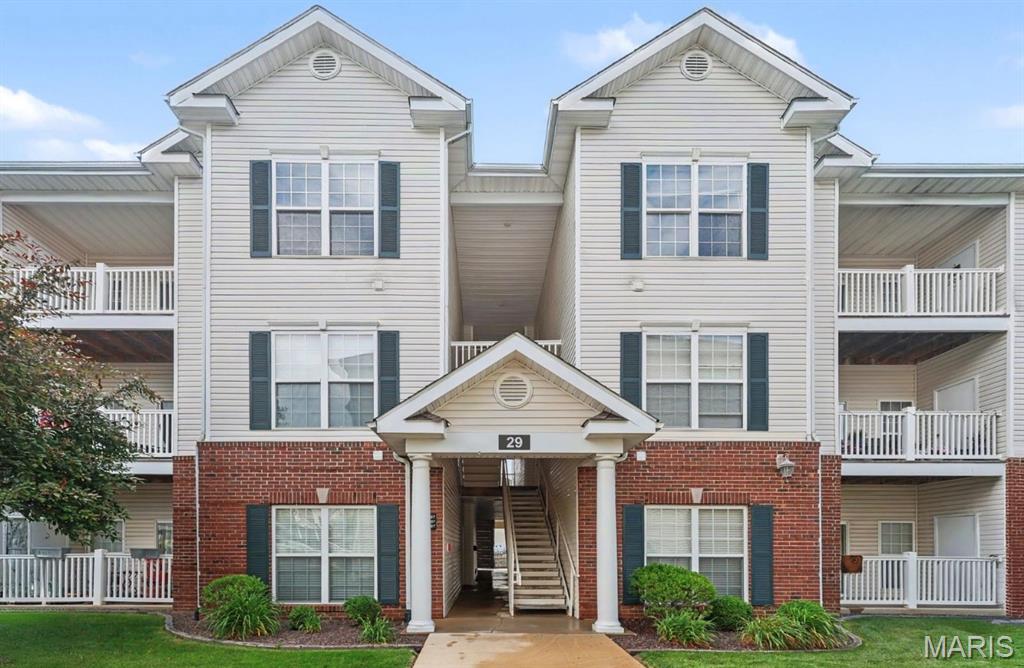 Welcome to this beautifully maintained, highly sought after first-floor condo offering the perfect combination of comfort, convenience, and low-maintenance living. Located in Bridgewater Cove, residents enjoy access to a clubhouse, pool, fitness center, walking trails, and dog park. Step inside to discover an inviting open layout featuring soaring ceilings, abundant natural light, and attractive engineered wood flooring throughout the main living areas. The spacious kitchen offers ample cabinet space and flows seamlessly into the dining and living areas, creating an ideal space for entertaining or relaxing at home. The private in-unit laundry room, conveniently located just off the kitchen, is another thoughtful feature designed for everyday convenience. The spacious primary bedroom features a walk-in closet and attached full bathroom. The generously sized second bedroom also features a walk-in closet and easy access to the second full hall bath. Enjoy time outside under your private covered patio with additional storage and the benefit of an assigned covered parking space. Conveniently located near shopping, dining, entertainment, and major highways, this condo offers exceptional value and a lifestyle buyers will appreciate. Opportunities for a move-in-ready, first floor unit don’t come along often - Schedule your showing today!