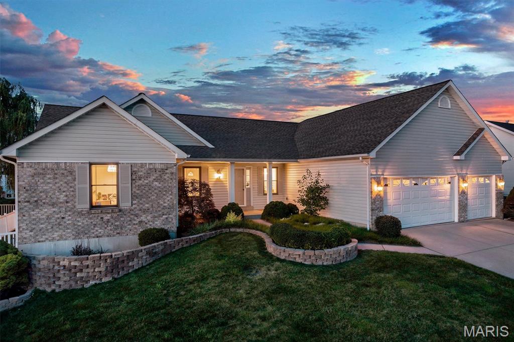 **Showings begin SATURDAY 11AM-1PM at the Open House** Tucked away off Bryan Road on a quiet street in sought-after Sunset Ridge Estates, this spacious ranch offers the perfect combination of everyday comfort, room to entertain, and surprisingly low utility costs. With nearly 3,900 square feet of finished living space, 3+ bedrooms, 3 full baths, and an oversized 3-car garage, there's space for everyone and everything.

From the moment you walk in, you'll appreciate the soaring vaulted ceilings, open floor plan, and inviting Great Room featuring a wood-burning fireplace. The kitchen offers stainless steel appliances, a center island, desk area, pantry, abundant cabinetry, and flows seamlessly into the breakfast room and living areas, making it ideal for both daily living and entertaining.

One of the home's most impressive features is what you don't immediately see. Paid-off solar panels, Anderson windows, quality insulation, and a high-efficiency Trane HVAC system with major components updated in 2023 help create a home that is exceptionally quiet, comfortable, and economical to own. Utility costs are remarkably low for a home of this size.

The finished lower level is an entertainer's dream, featuring a huge family room, wet bar/kitchen, media area, gym, two additional sleeping rooms connected by a Jack-and-Jill bathroom, and plenty of storage space. Whether you're hosting game day, holiday gatherings, overnight guests, or simply need room to spread out, this lower level delivers.

Step outside to enjoy the covered patio and fenced backyard, offering the perfect setting for pets, play, gardening, or relaxing summer evenings. The oversized 3-car garage provides ample space for vehicles, tools, hobbies, and workshop needs.

Residents enjoy access to community amenities including a neighborhood pool, clubhouse, and common ground, all within the highly regarded Wentzville School District.

Large enough to host the holidays, efficient enough to keep monthly costs manageable, and thoughtfully designed for both entertaining and everyday living, this is the kind of home buyers wait for. Near I-64 and I-70, this home delivers an easy commute and overall great location.