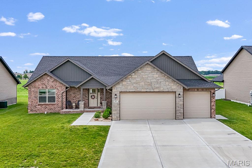 Welcome to this beautiful 5-bedroom, 3-bath home in the desirable Liberty Place subdivision! From the moment you arrive, you'll appreciate the exceptional curb appeal, highlighted by a spacious 3-car garage and an inviting exterior.

Inside, the open-concept floor plan is designed for both everyday living and entertaining. The main living area flows seamlessly into the kitchen and dining space, with easy access to the covered patio overlooking the fenced backyard—perfect for relaxing, hosting gatherings, or enjoying outdoor living.

Convenience meets functionality with a main-floor laundry room and a thoughtfully designed layout. The luxurious primary suite offers a private retreat featuring a large walk-in closet and an impressive en-suite bathroom with dual vanities and plenty of space to unwind.

The finished lower level expands your living space with two additional bedrooms and a generous recreation/family room, providing endless possibilities for entertaining, hobbies, or a home theater.

Offering space, style, and a fantastic location in Liberty Place, this home is ready to welcome its next owners. Schedule your private showing today!